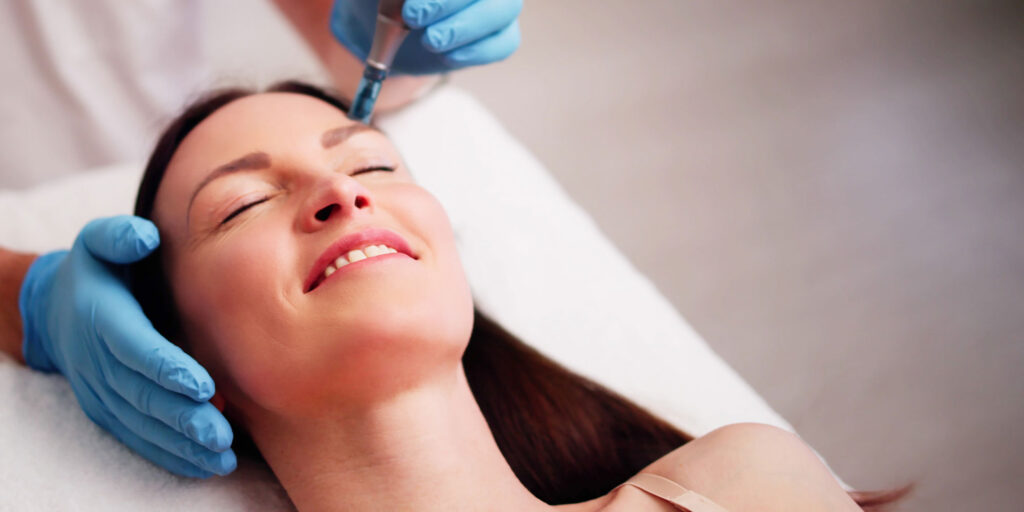 patient under going micro needle treatment